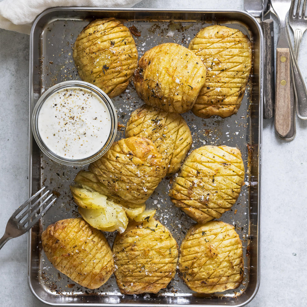 Sprøde ovnkartofler med kapersdressing