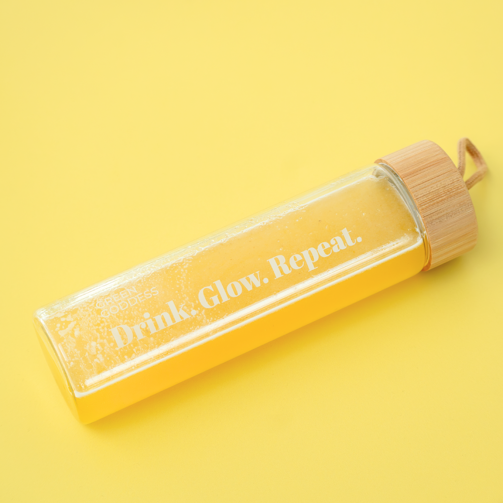 Green Goddess drikkeflaske med teksten Drink. Glow. Repeat.